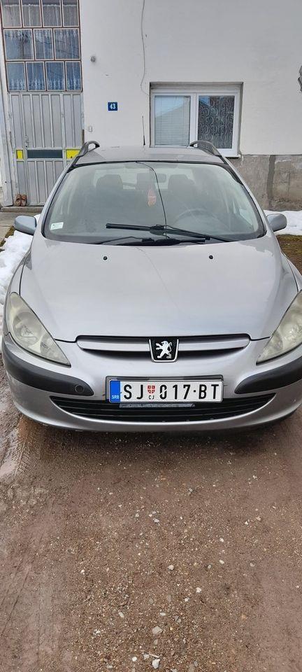 2003-Peogeut-307