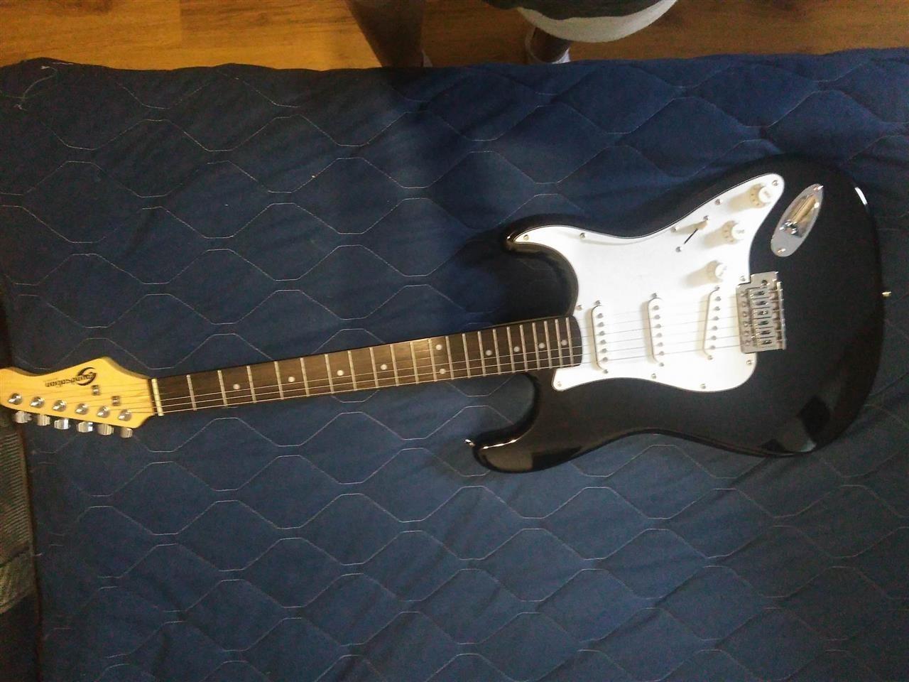 Gitara-u-odličnom-stanju--nekorišćena-